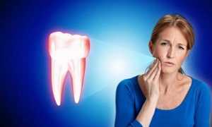 Что делать, если болит зуб под коронкой, хотя нерв удален? Основные причины дискомфорта